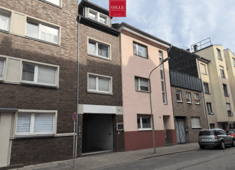 Gepflegtes Wohn- und Geschäftsgebäude mit drei vermieteten Wohnungen und großzügiger Gewerbefläche, 41460 Neuss, Mehrfamilienhaus